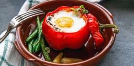 Fried Egg in a Bell Pepper with Ham, Cheese, and Onions