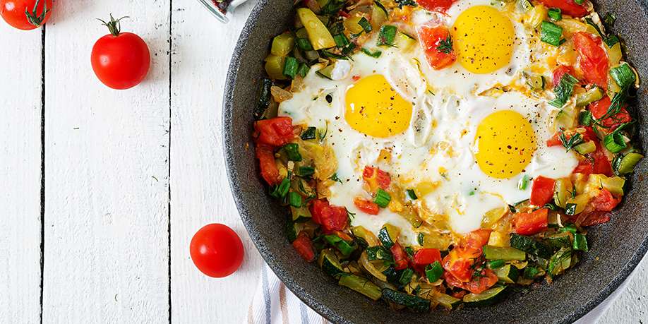 Fried Eggs with Bread and Vegetables