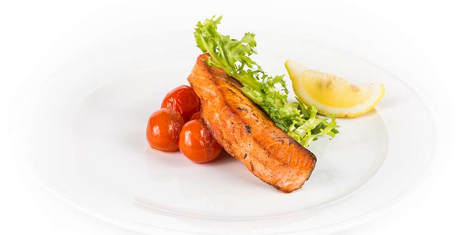 Fried Salmon on a Bed of Baked Tomatoes