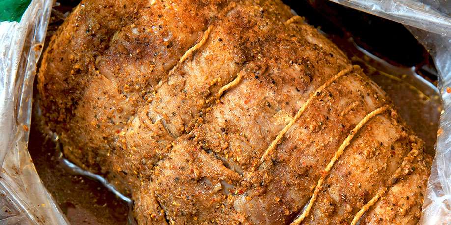 Sleeve Baked Pork with Herbs, Garlic, and Lemon Sauce