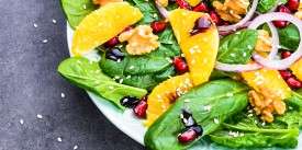 Spinach Salad with Walnuts, Oranges, Pomegranate, and Sesame Seeds